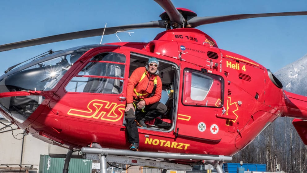 Anesthesiologist and air rescue emergency physician Dr. Ulrich Steiner in a rescue helicopter