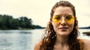 Frau mit Sonnenbrille; Brillen: Tönung und Filter