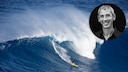 Ein Surfer reitet eine riesige Welle