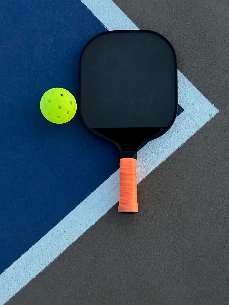 Pickleball: Ball and paddle