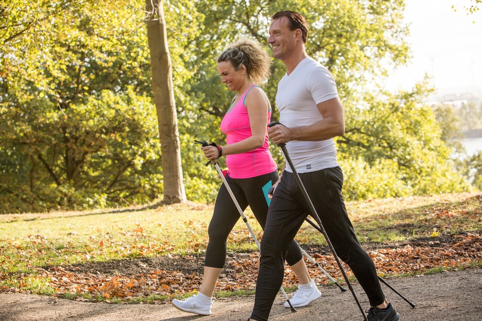 A man and a woman Nordic walking