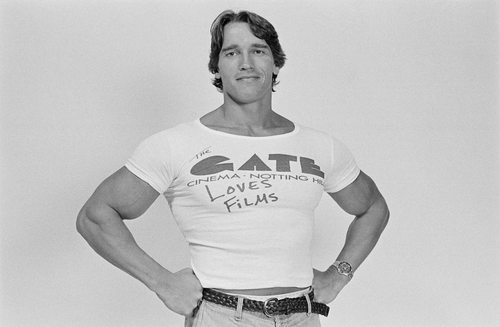 Arnold Schwarzenegger's records in bench press, squat, and deadlift