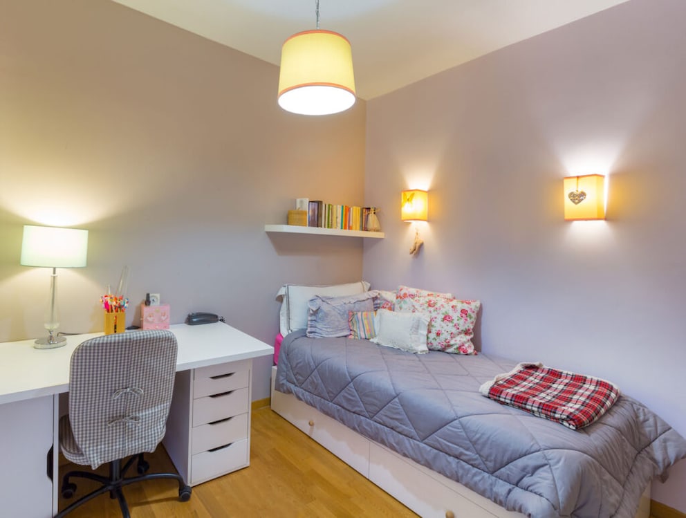 Bed drawer in small bedroom