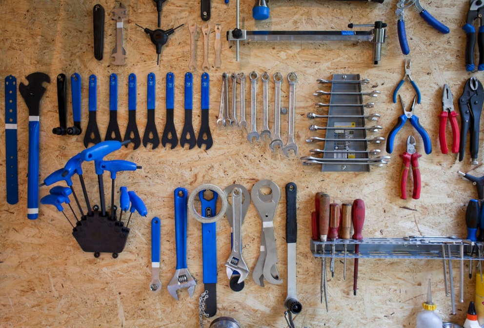 Tools mounted on a workshop wall to create more space