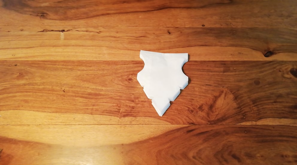 Making a Christmas star from paper bags