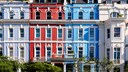 Biozide Hausfassade: Mehrere H&auml;user mit bunten Hausfassaden