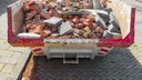 Voller Baucontainer