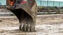 Bagger beginnt zu Schaufeln
