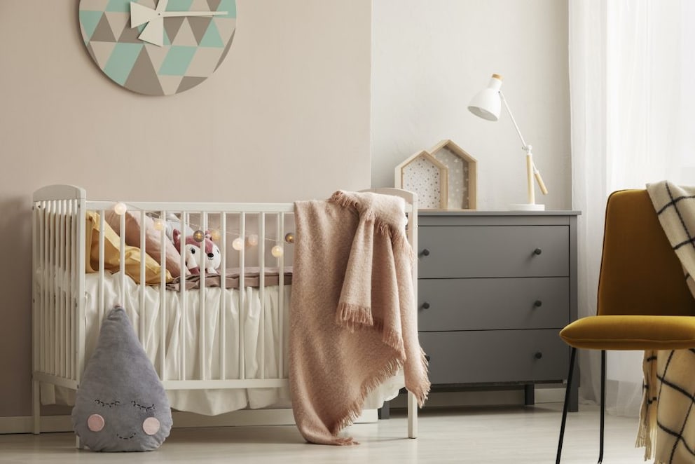 Soft, neutral colors and warm natural materials adorn this children's room