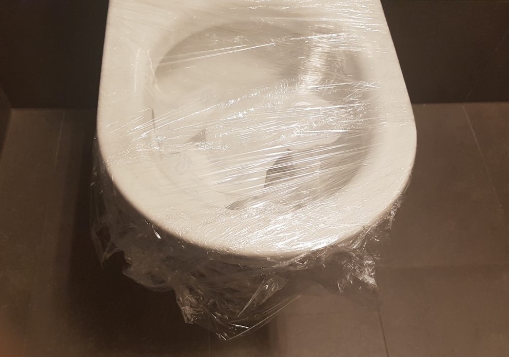 Toilet clogged plastic wrap