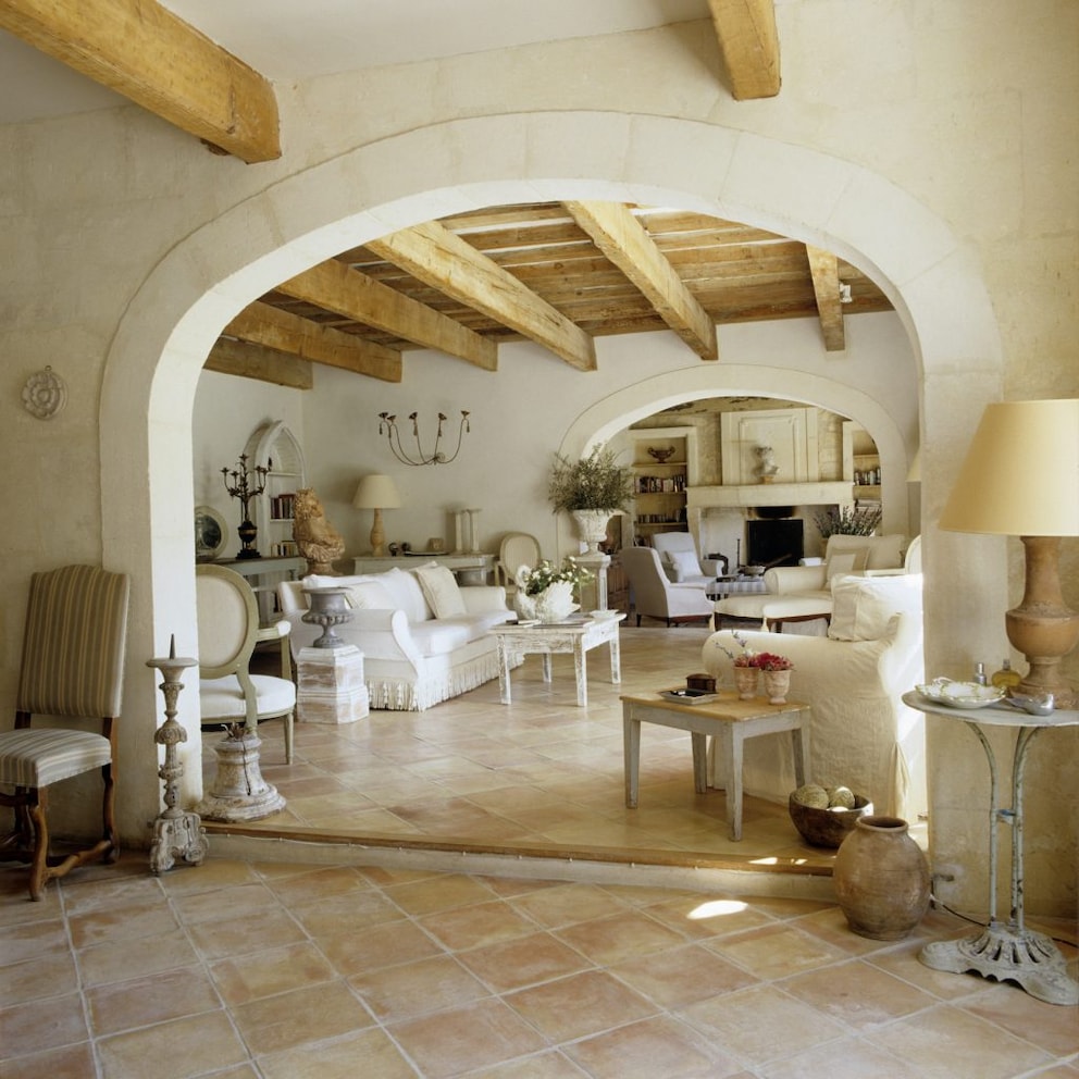 Brightly decorated Mediterranean living room with many different accessories and materials