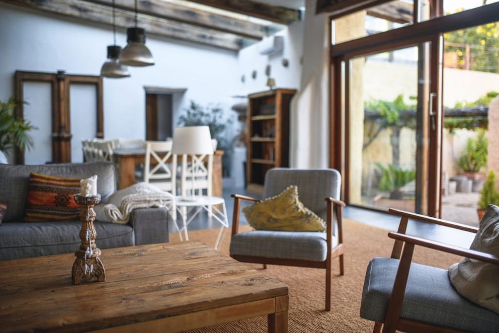 Mediterranean living room with lots of wood