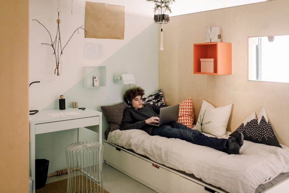 Scandinavian bedroom with graphic patterns and clear shapes