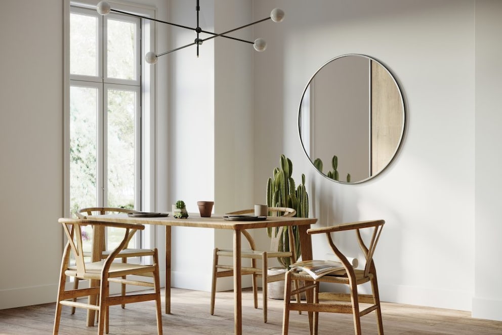 Dining room with large mirror