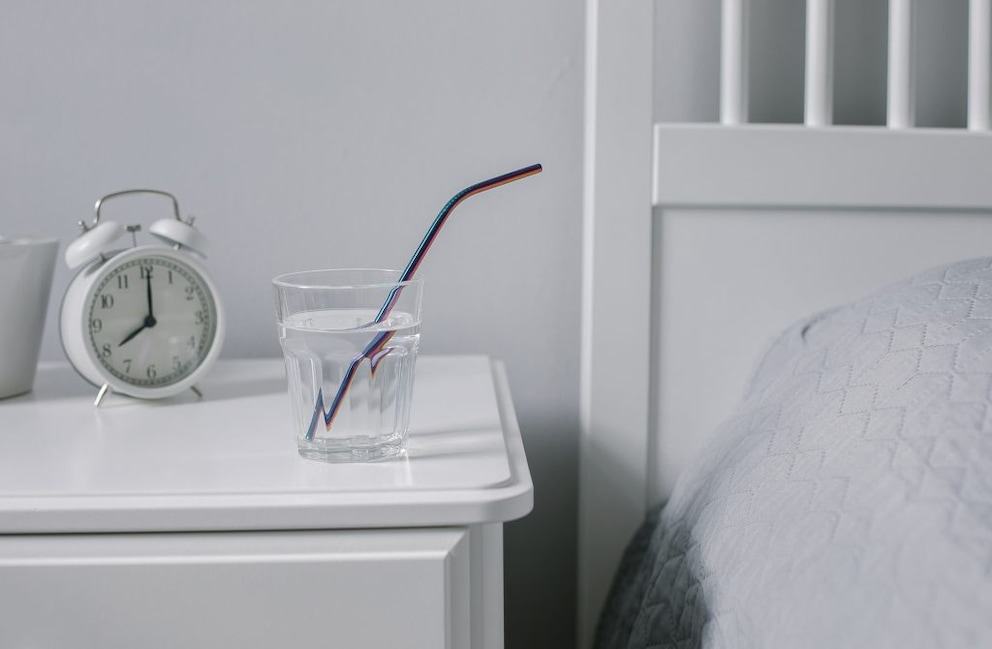 Minimal decor and neutral colors are ideal for a bedroom with a calming effect