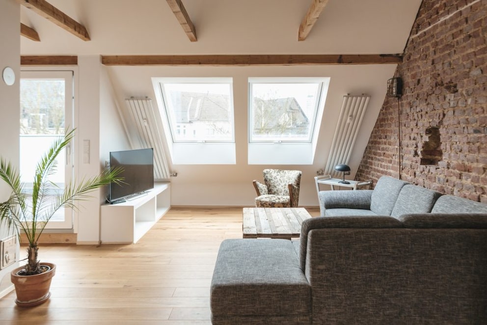 Custom furniture for the living room with sloped ceiling