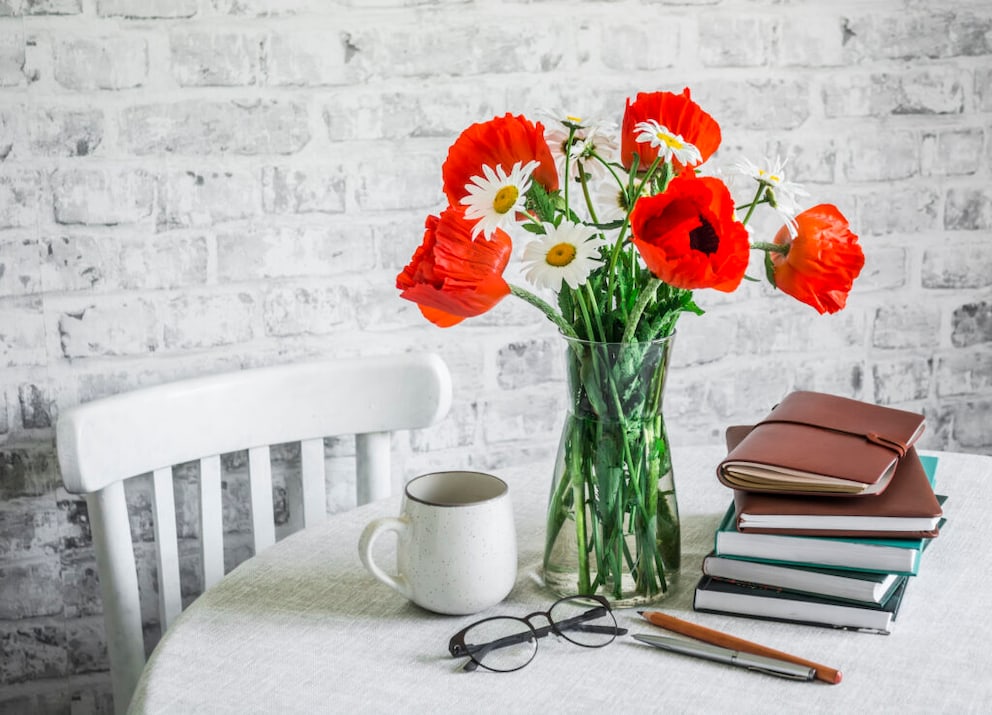 Poppies in a vase on the kitchen table