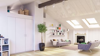 Modernes Wohnzimmer unterm Dach mit verschiedenen Stauraummöglichkeiten