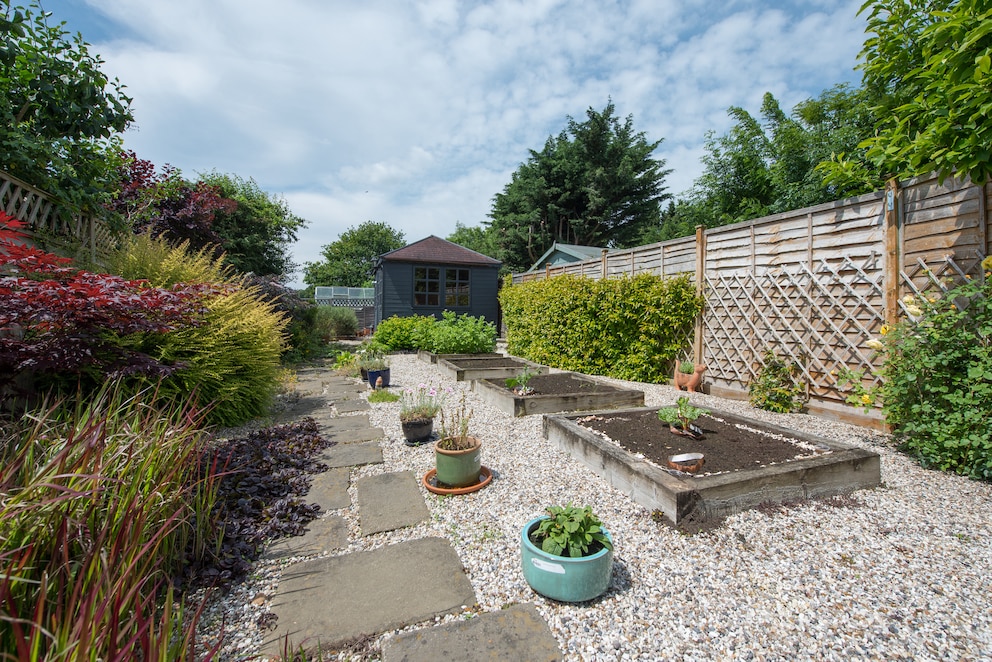 Durch Gartenwege kann der Blick geschickt gelenkt werden