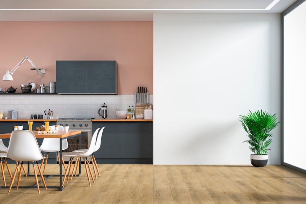 Peach Fuzz as a wall surface behind the kitchen unit