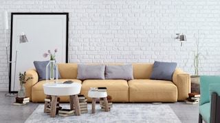 Hellgelbes Modulsofa im Wohnzimmer