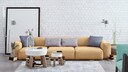 Hellgelbes Modulsofa im Wohnzimmer
