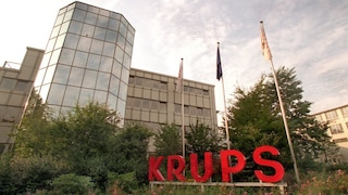Krups Logo vore einem großen Gebäude