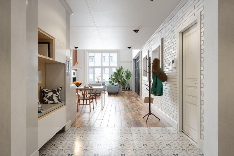 Cabinet wall with bench and integrated shoe storage in the hallway