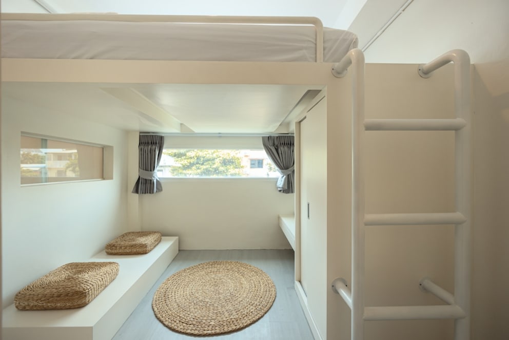 Lounge area under the loft bed