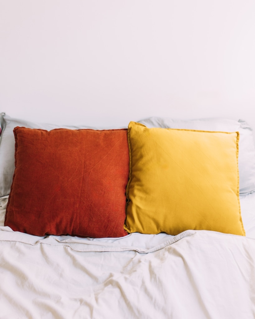 Two cushions in red and yellow
