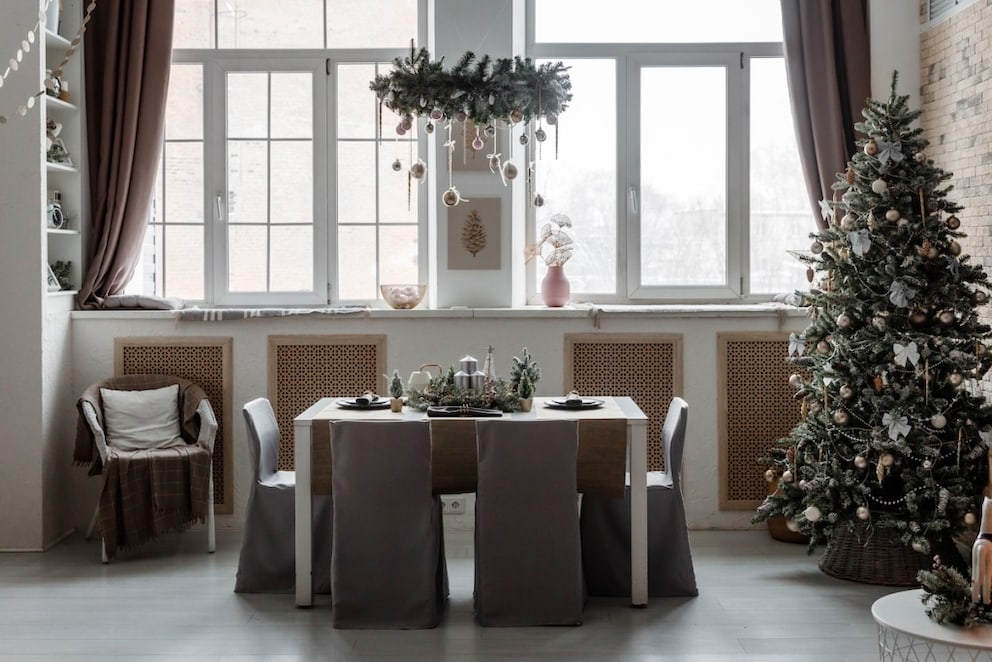 Christmas wreath above the festive table