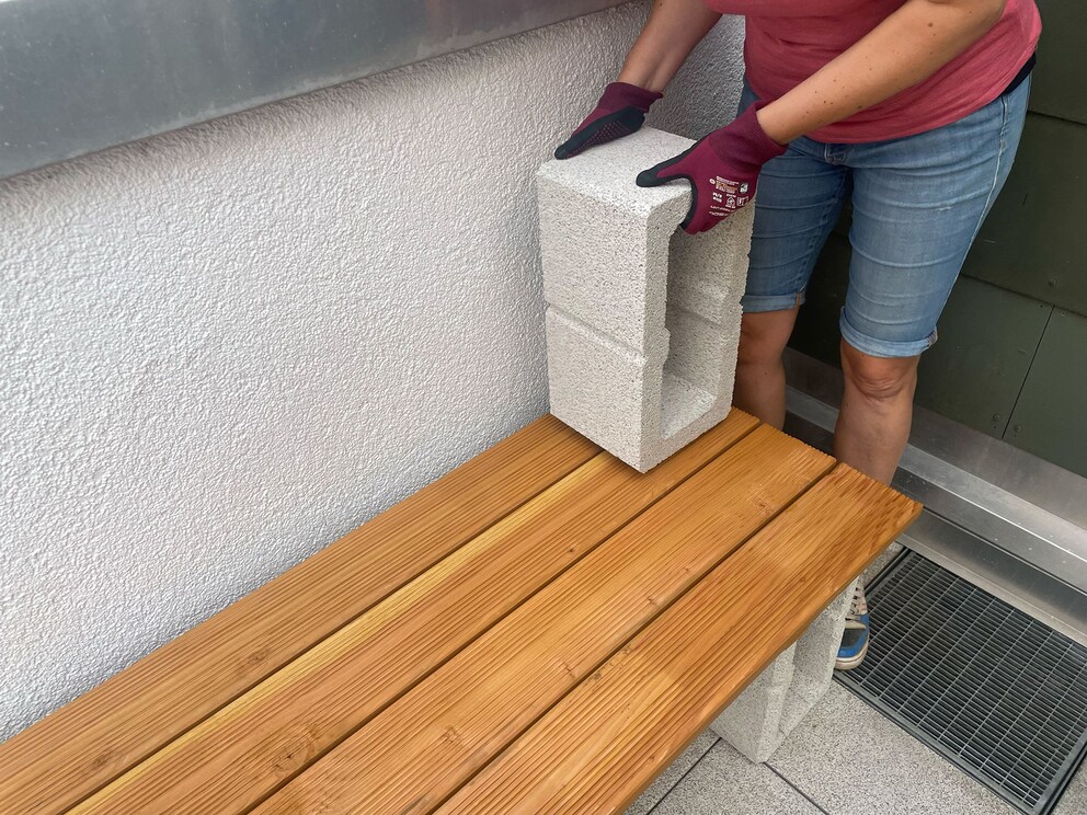 Small hooks for storage on a grill station
