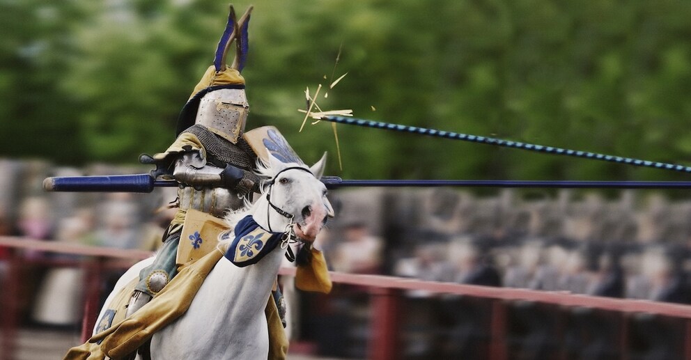 Knight with broken lance on a galloping horse