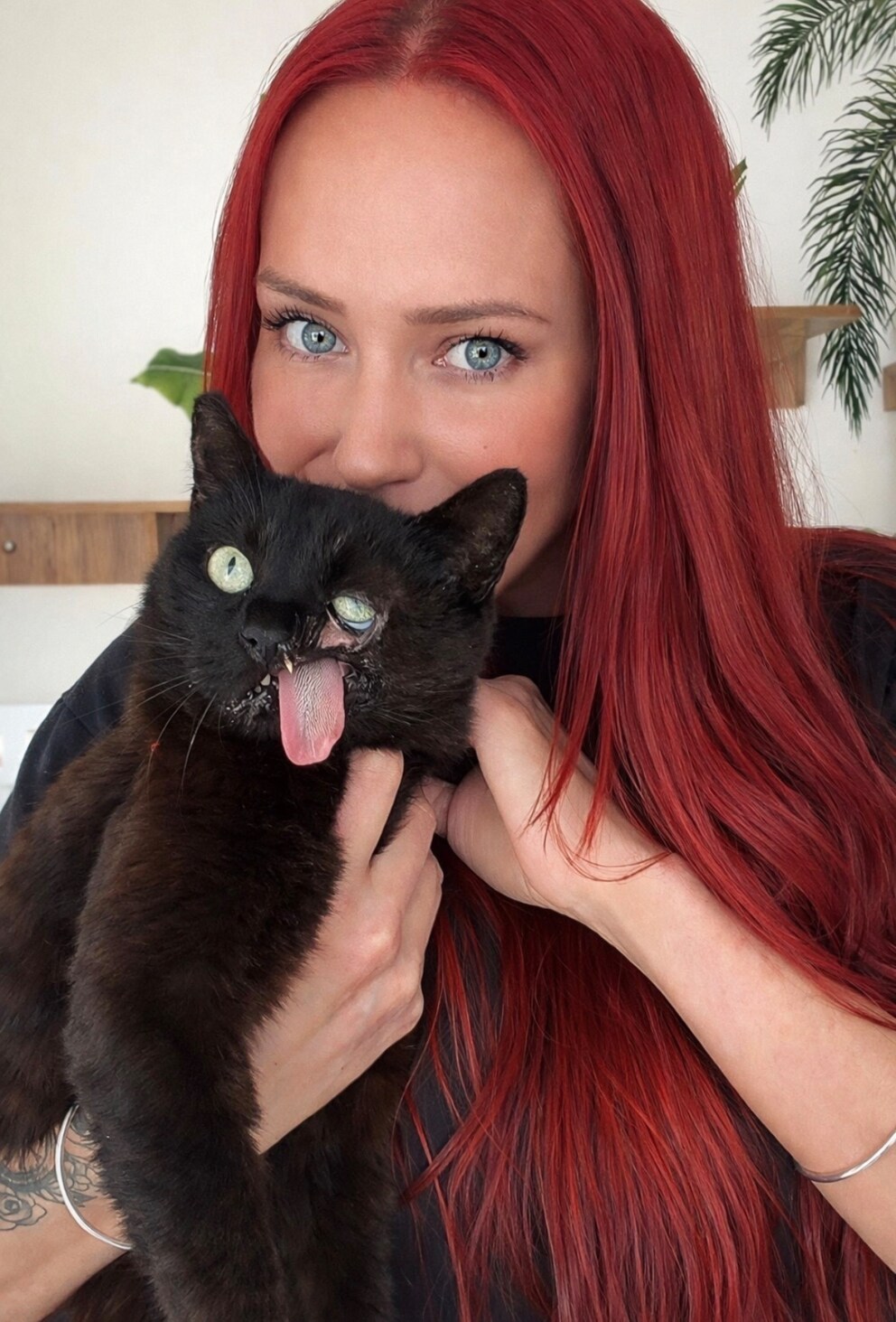 Shelly with her cat Raven