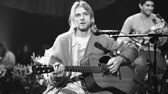 American singer and guitarist Kurt Cobain (1967 - 1994), performs with his group Nirvana at a taping of the television program 'MTV Unplugged,' New York, New York, Novemeber 18, 1993. Guitarist Pat Smear is visible at rear right. (Photo by Frank Micelotta/Getty Images)