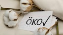 Baumwolle und ein Öko-Schild