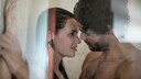 Frau und Mann beim Sex unter der Dusche