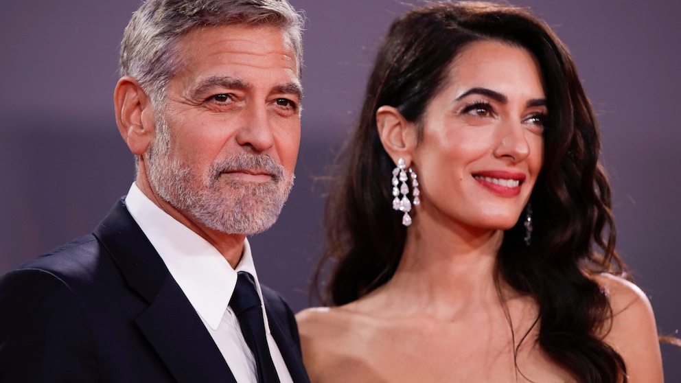 Amal und George Clooney auf dem roten Teppich