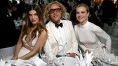 Peter Dundas umgeben von Model Eva Herzigova und Bianca Brandolini d'Adda