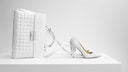 Handtasche und High Heels