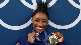 Simone Biles und ihre Kette mit Ziegenanhänger – GOAT steht im Englischen für Greatest Of All Time