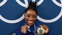 Simone Biles und ihre Kette mit Ziegenanhänger – GOAT steht im Englischen für Greatest Of All Time