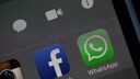 Logo WhatsApp auf einem Handy-Display