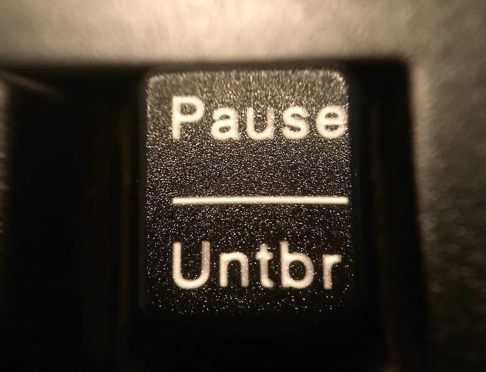 Nahaufnahme der Taste „Pause“