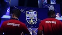 Zwei Schiedrichter beim FIFA eWorld Cup