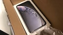 iPhone XR in einem Versandkarton