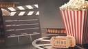 Filmklappe und Popcorn