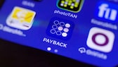Payback-Symbol auf Handy-Display
