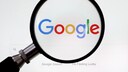 Google Chrome Update: Google Logo mit Lupe