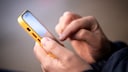 Smartphone in der Hand